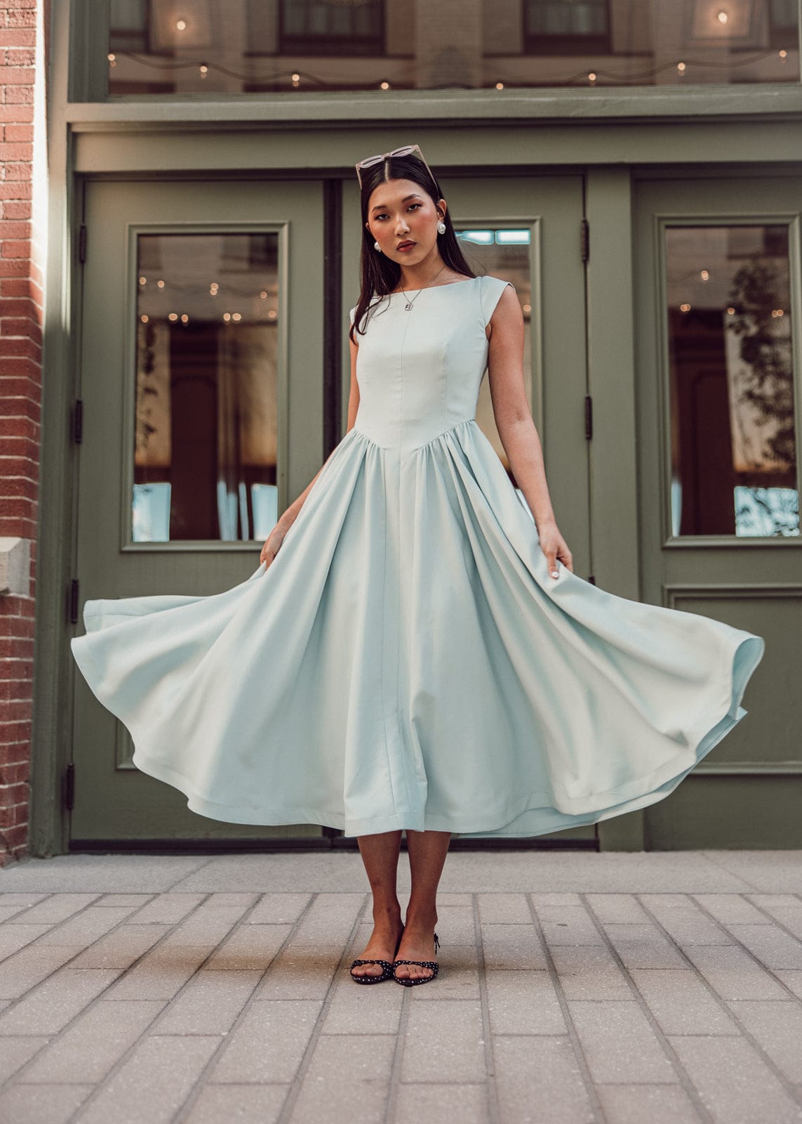 chic size inclusive model wearing JessaKae Diana Dress