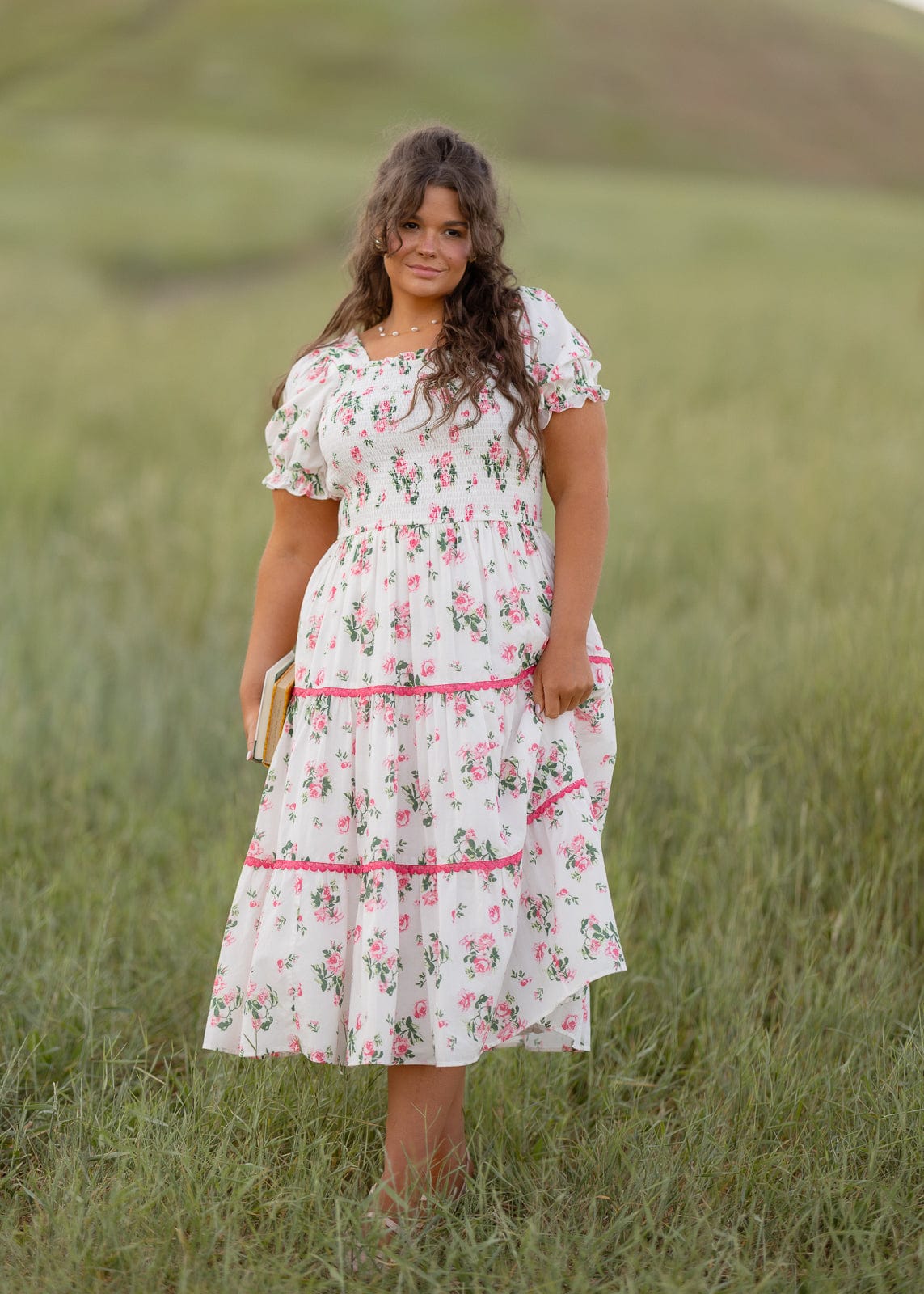 chic size inclusive model wearing JessaKae Evalina Dress