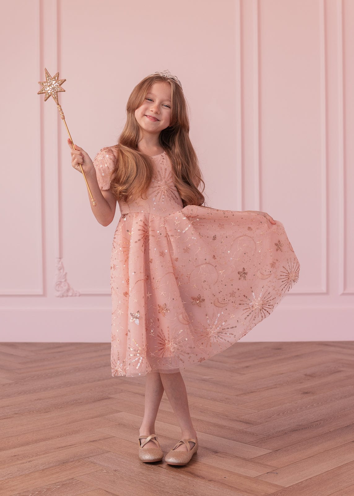 chic size inclusive model wearing JessaKae Glinda Girls Dress