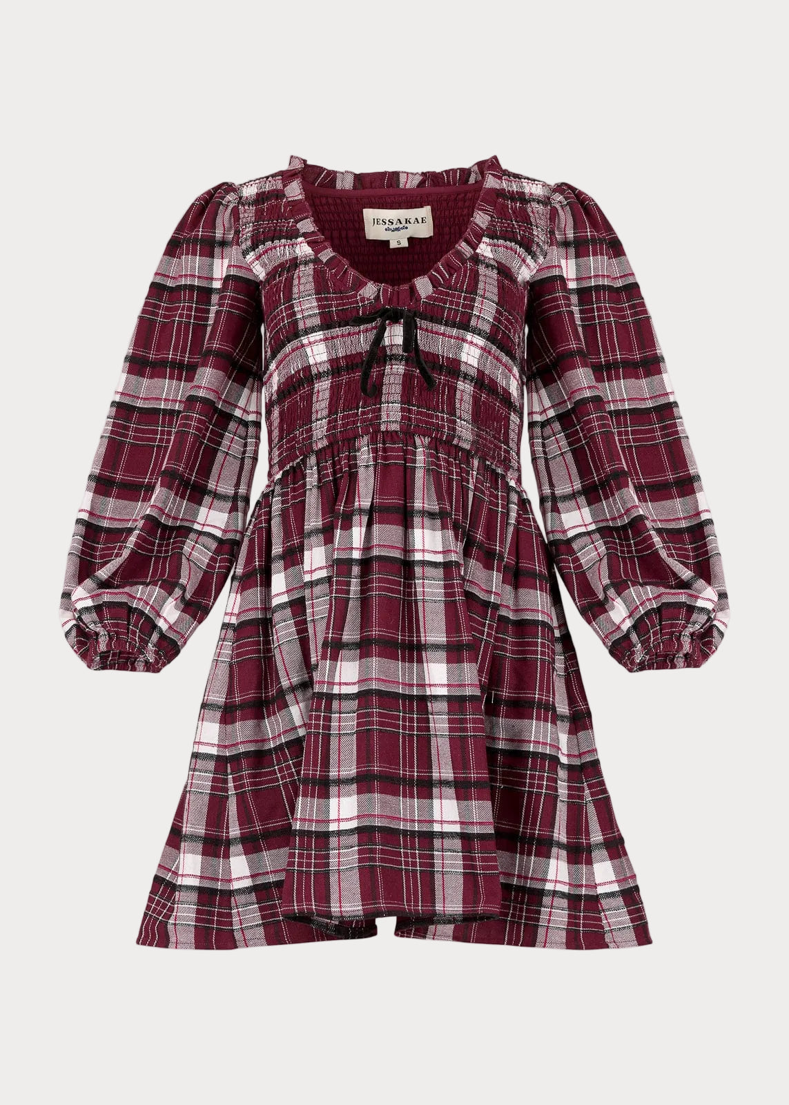 chic size inclusive model wearing JessaKae Hailey Dress