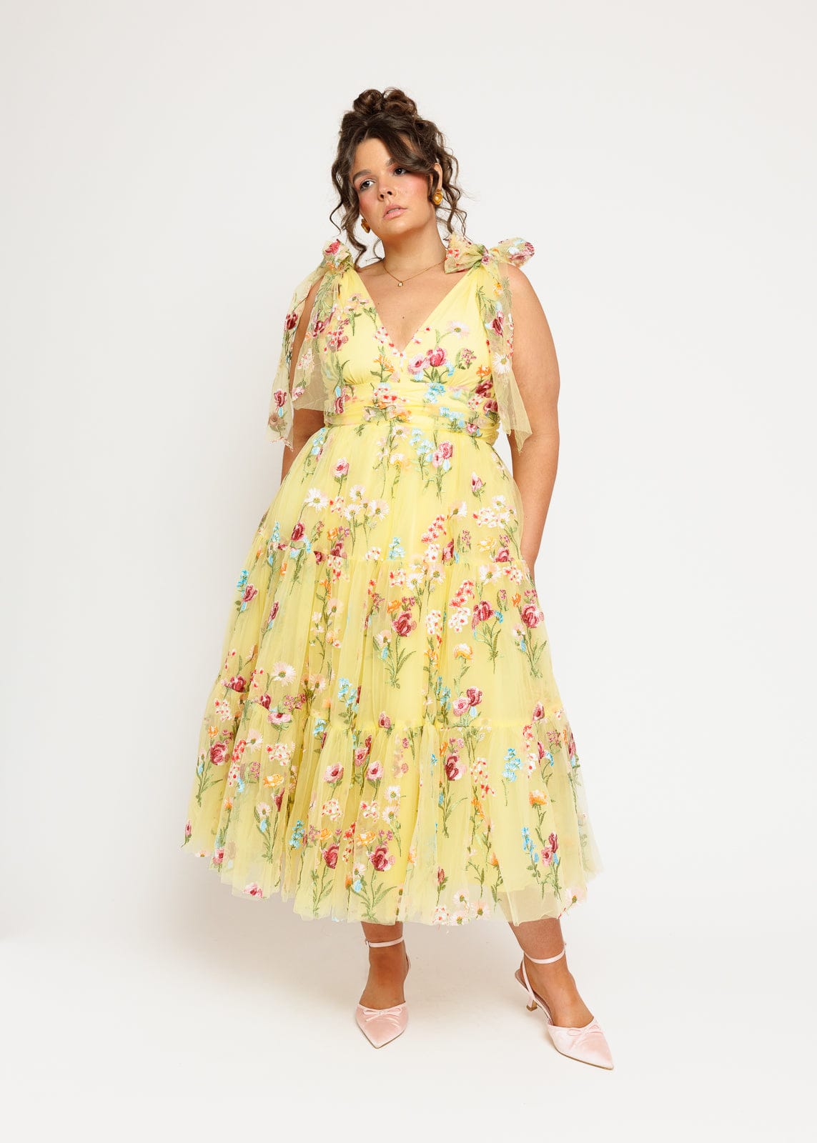chic size inclusive model wearing JessaKae Margaret Floral Embroidered Midi Dress Yellow Dresses