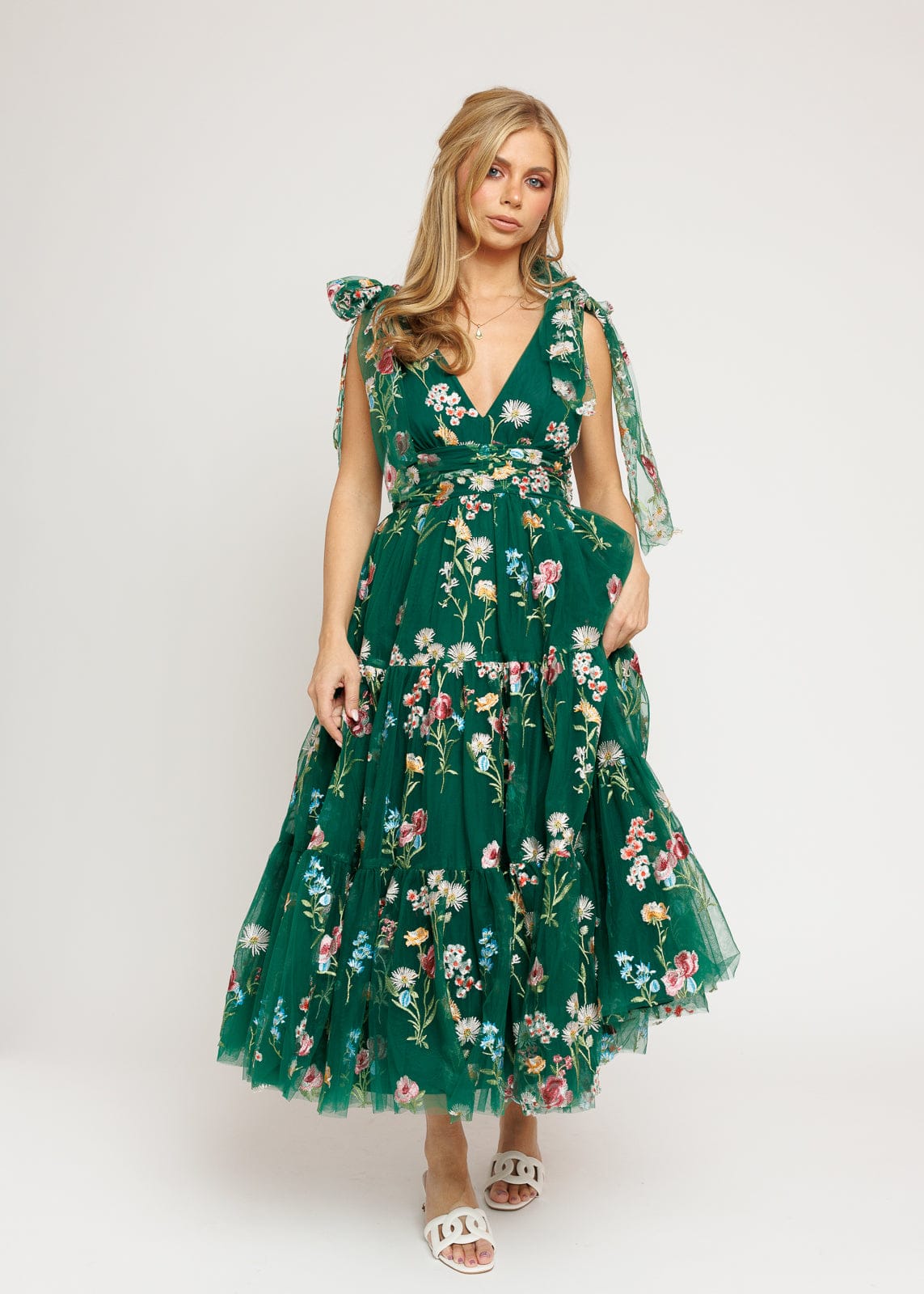 chic size inclusive model wearing JessaKae Margaret Floral Midi Dress Emerald Dresses