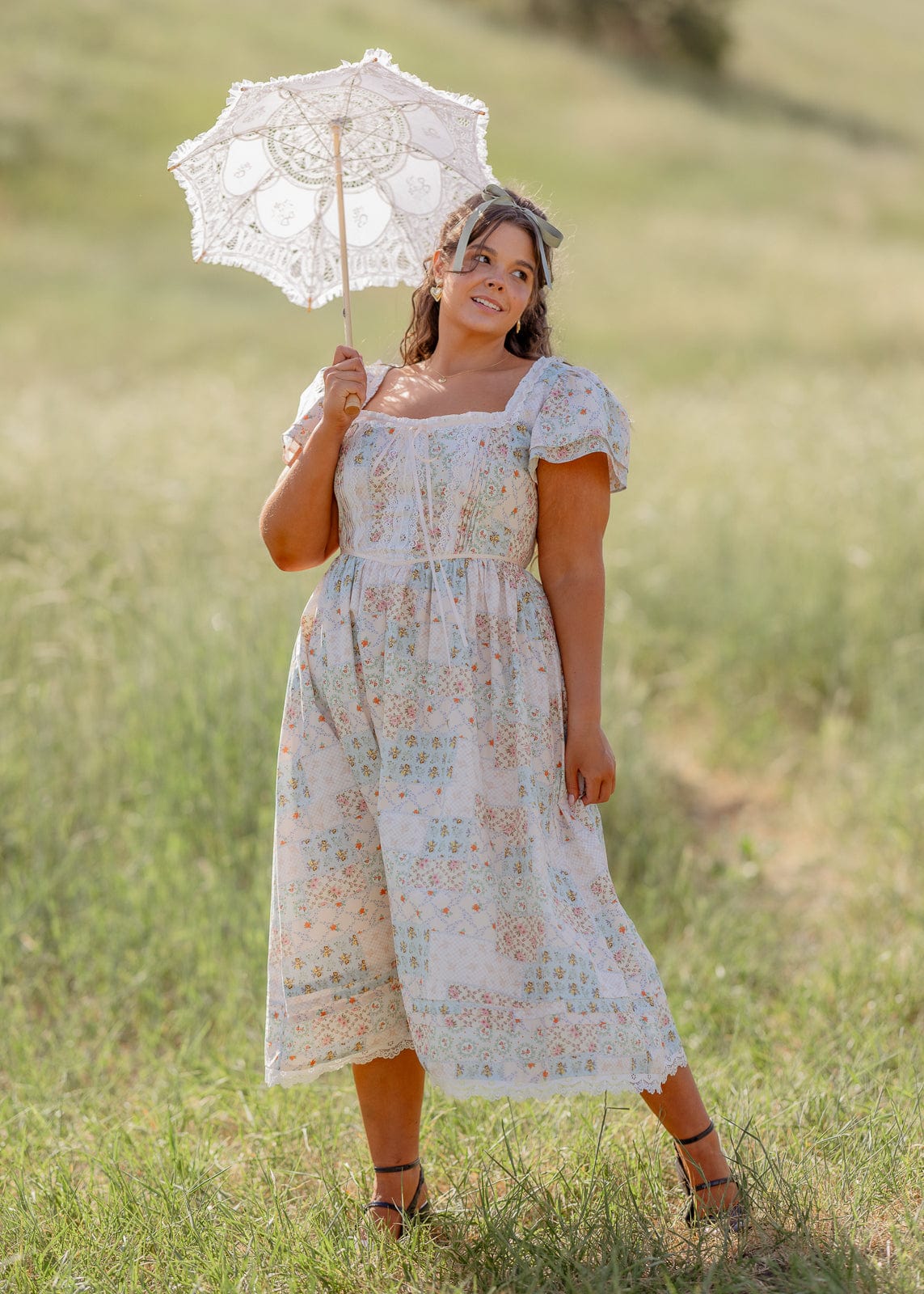 chic size inclusive model wearing JessaKae Megan Dress