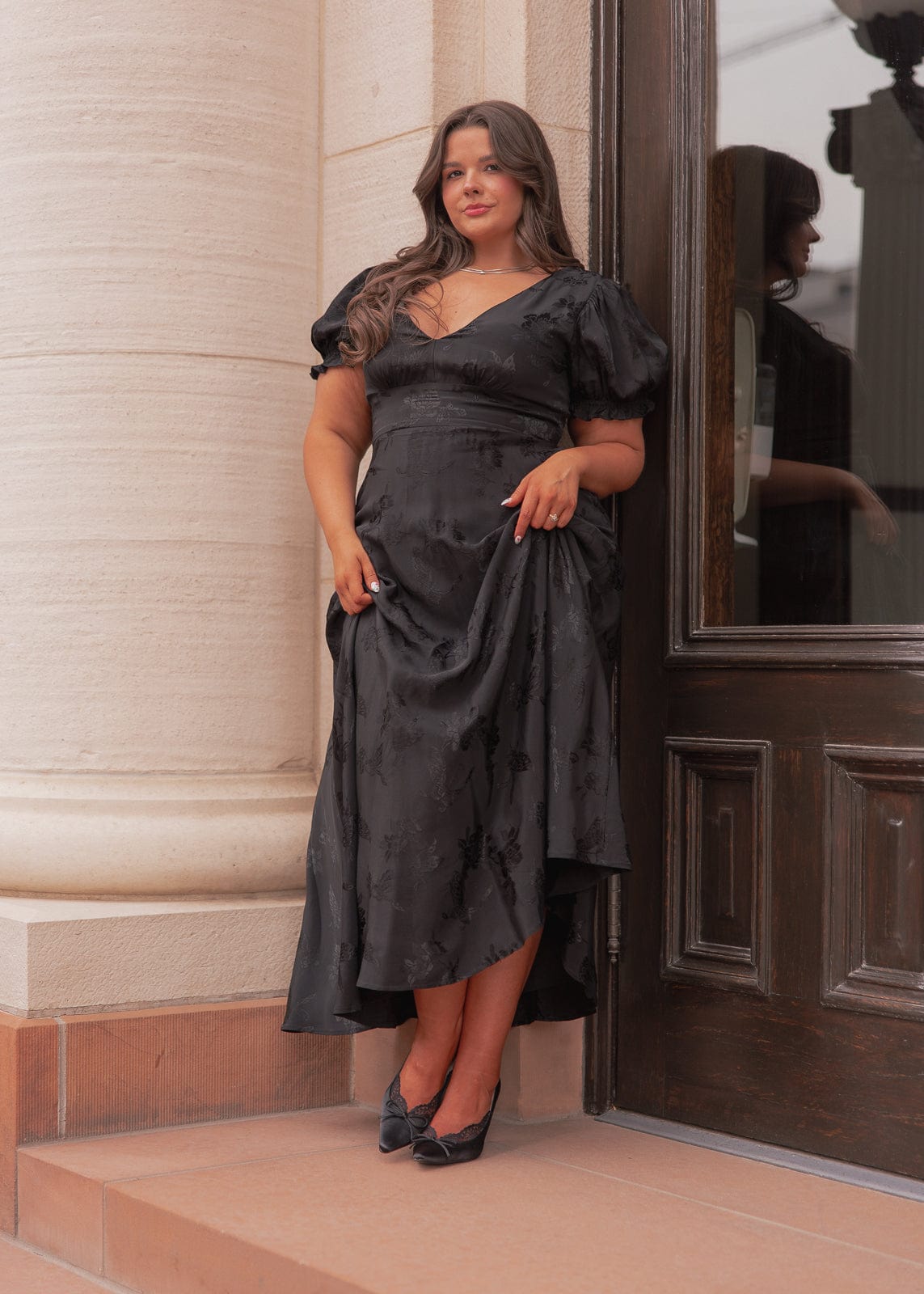 chic size inclusive model wearing JessaKae Mila Dress