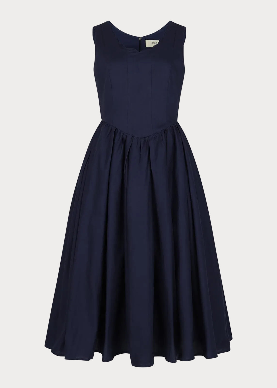 chic size inclusive model wearing JessaKae Nantucket Grove Dress