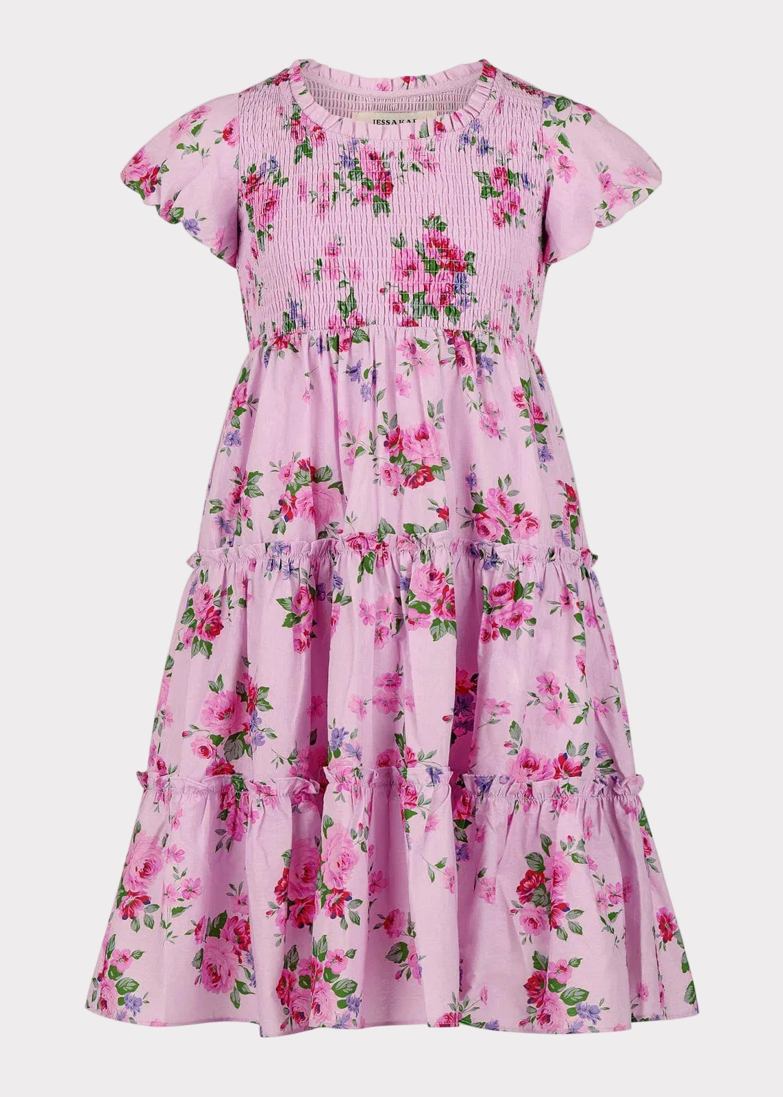 chic size inclusive model wearing JessaKae Olivia Girls Dress