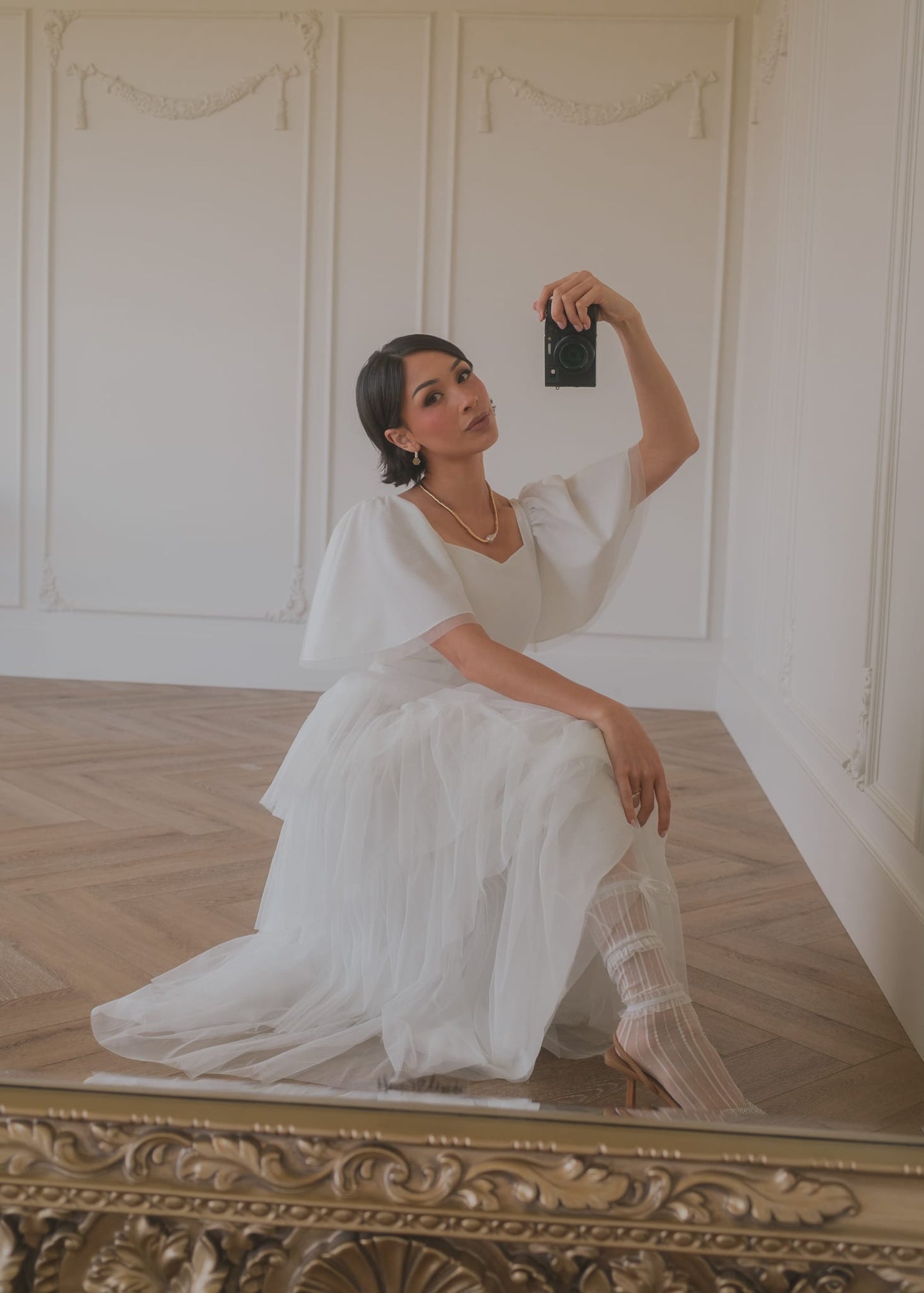 chic size inclusive model wearing JessaKae Allegro Dress White Dresses