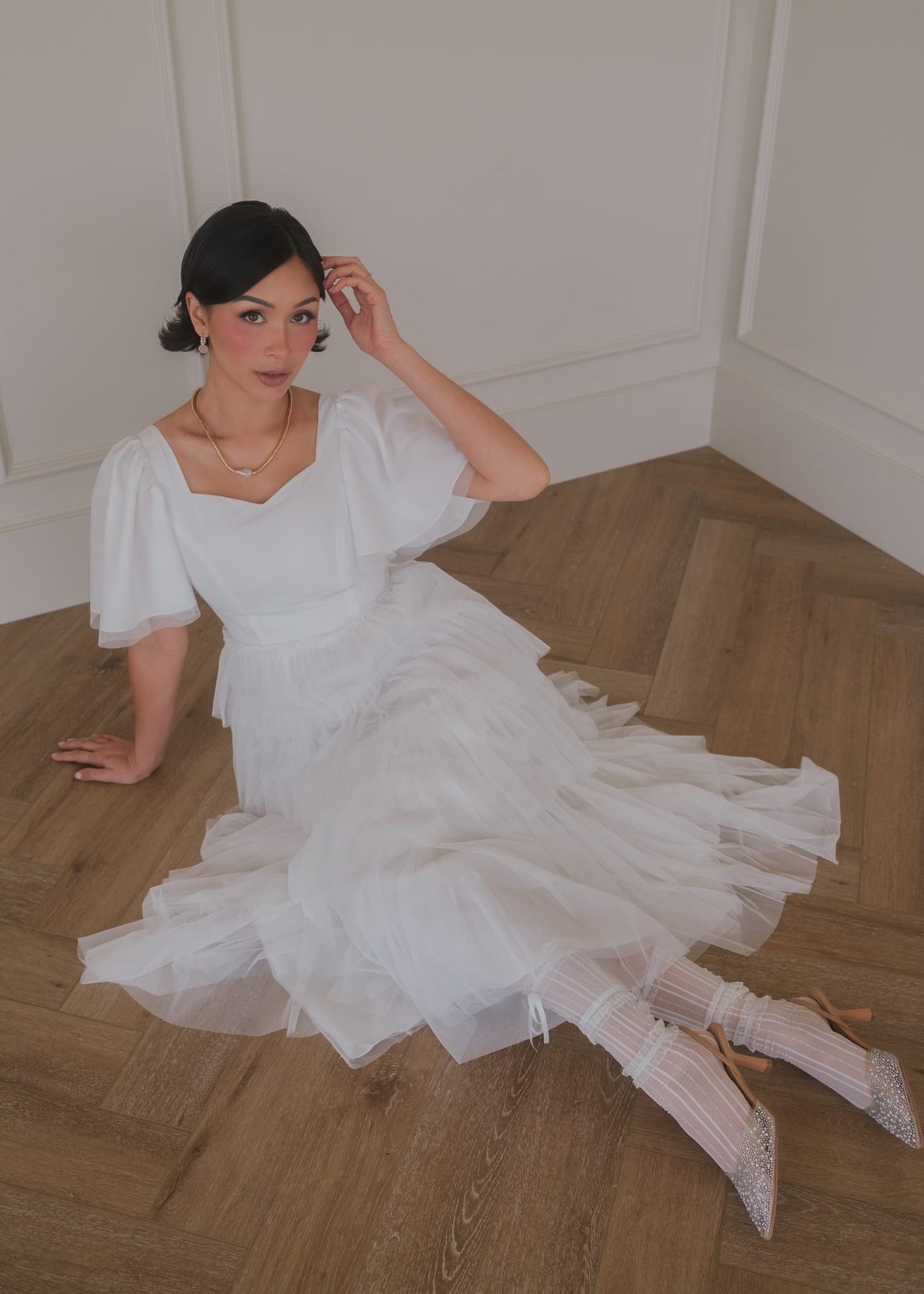 chic size inclusive model wearing JessaKae Allegro Dress White Dresses