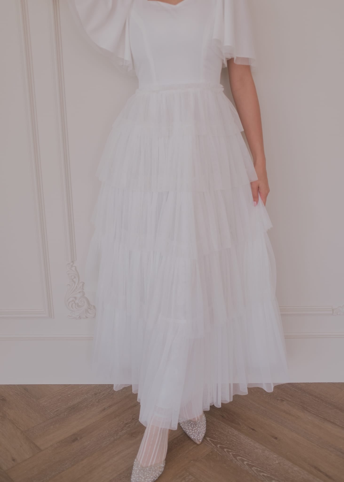 chic size inclusive model wearing JessaKae Allegro Dress White Dresses