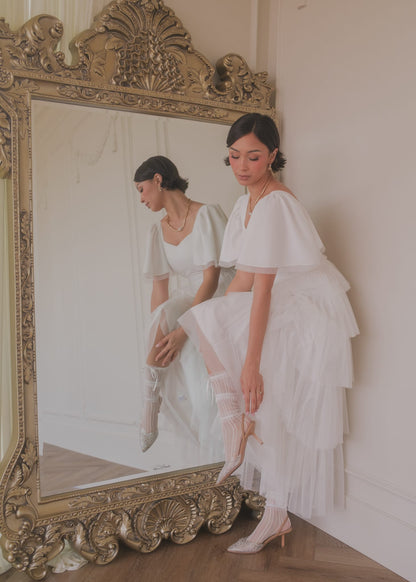 chic size inclusive model wearing JessaKae Allegro Dress White Dresses