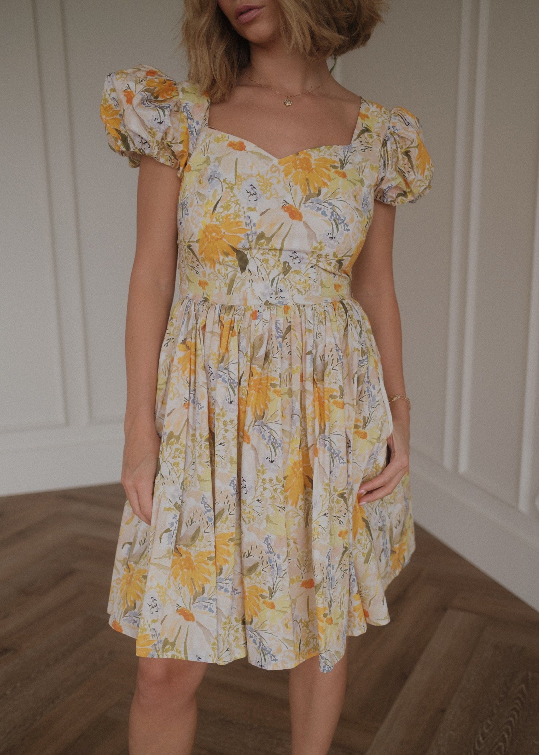 chic size inclusive model wearing JessaKae Amara Dress Dresses