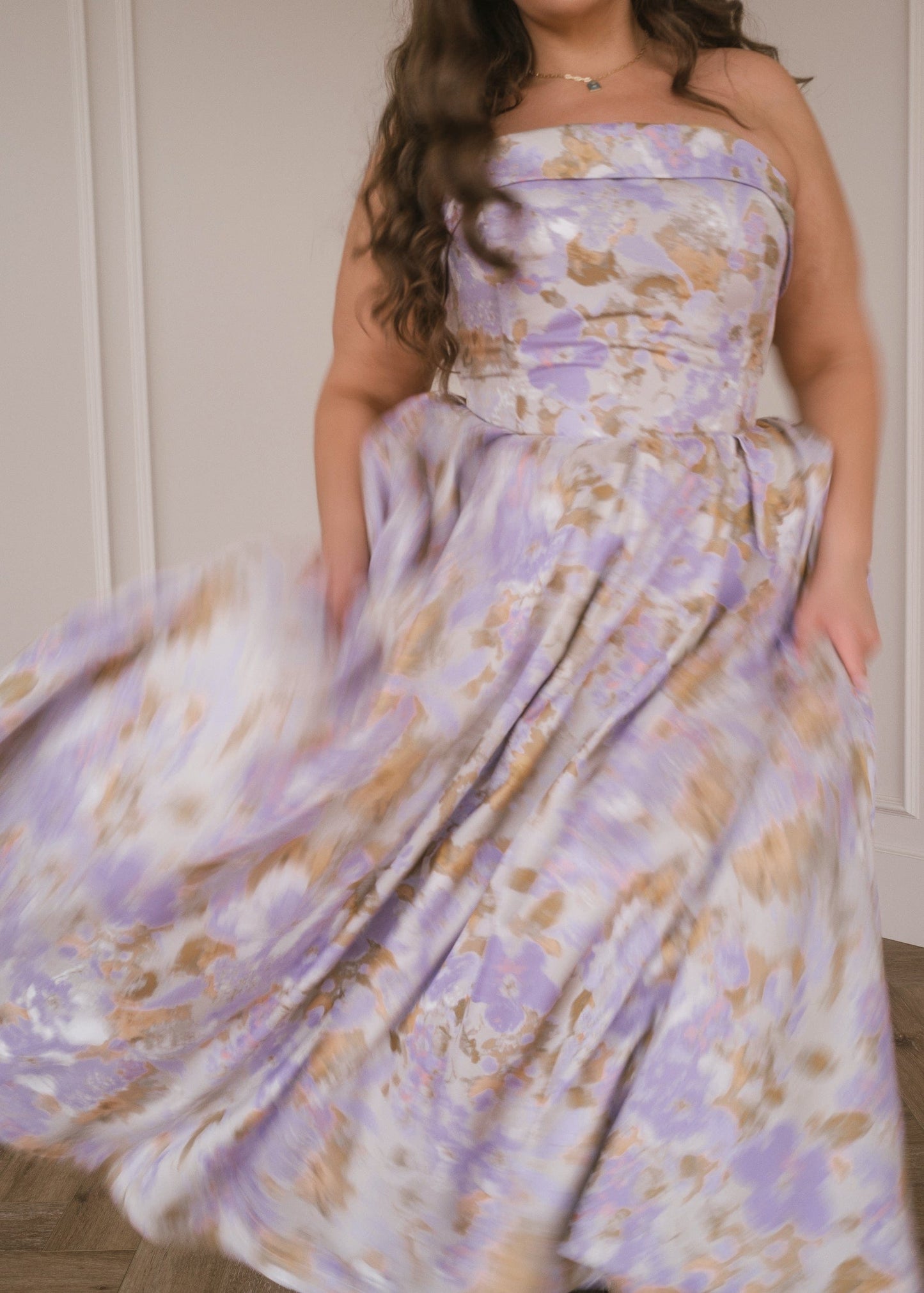 chic size inclusive model wearing JessaKae Anastelle Dress