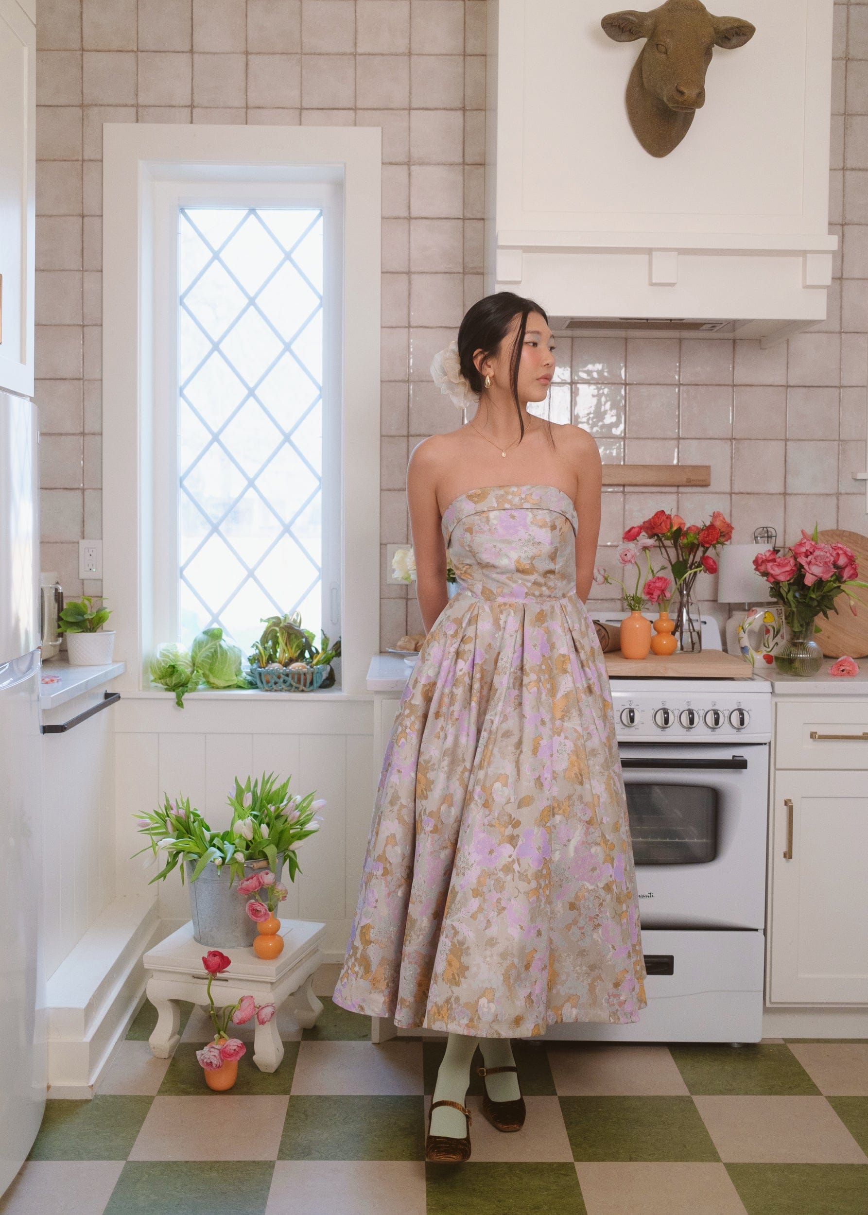 chic size inclusive model wearing JessaKae Anastelle Dress