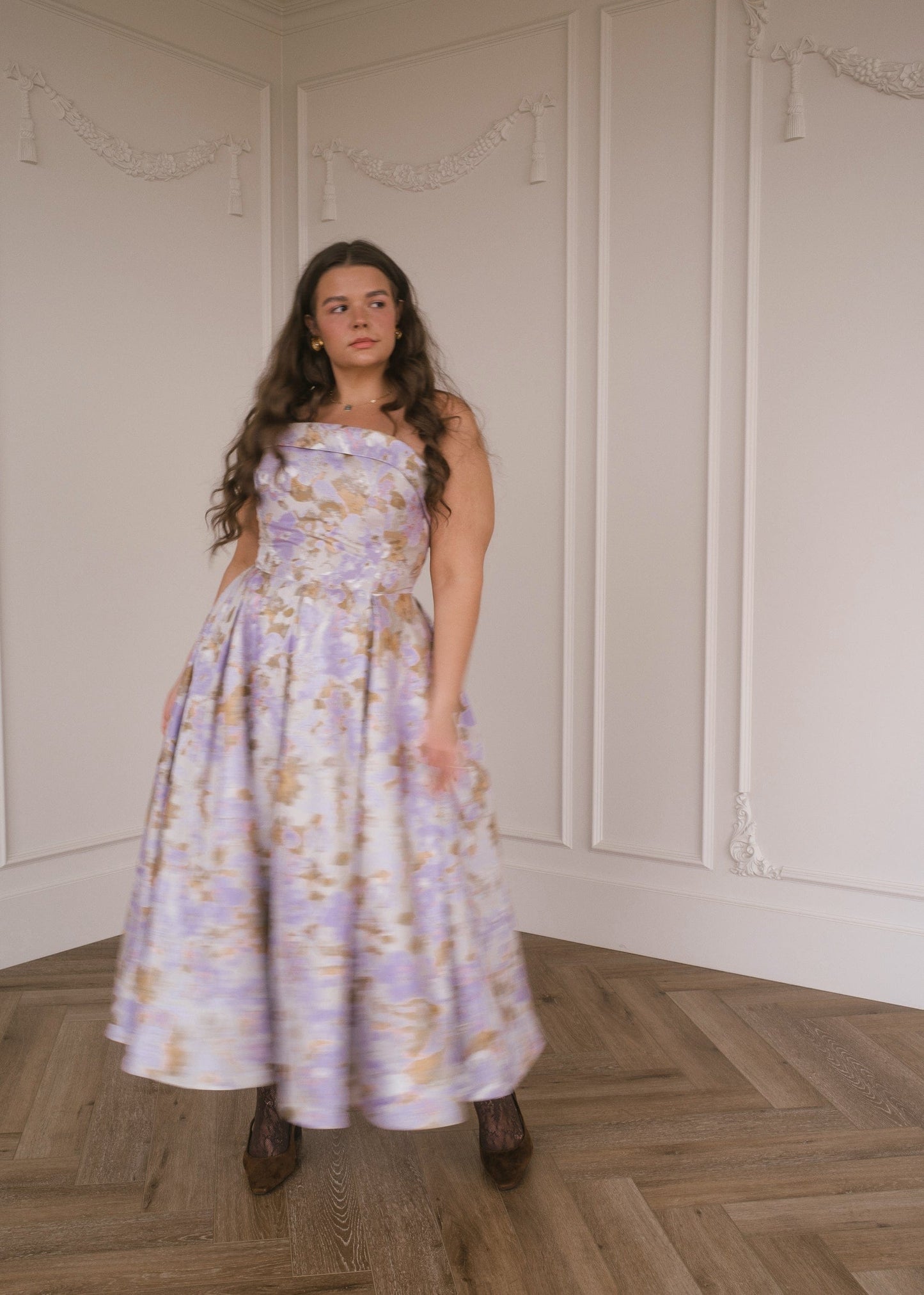 chic size inclusive model wearing JessaKae Anastelle Dress