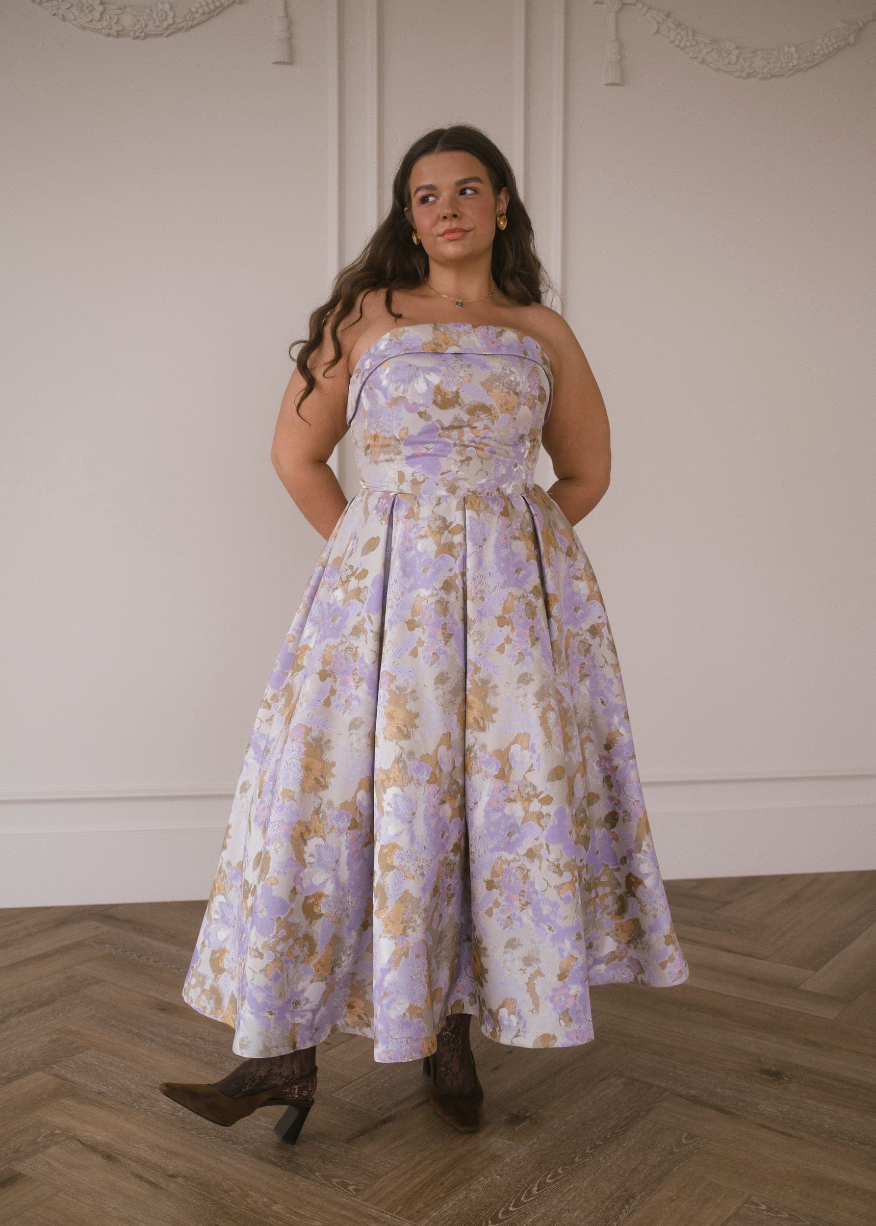 chic size inclusive model wearing JessaKae Anastelle Dress