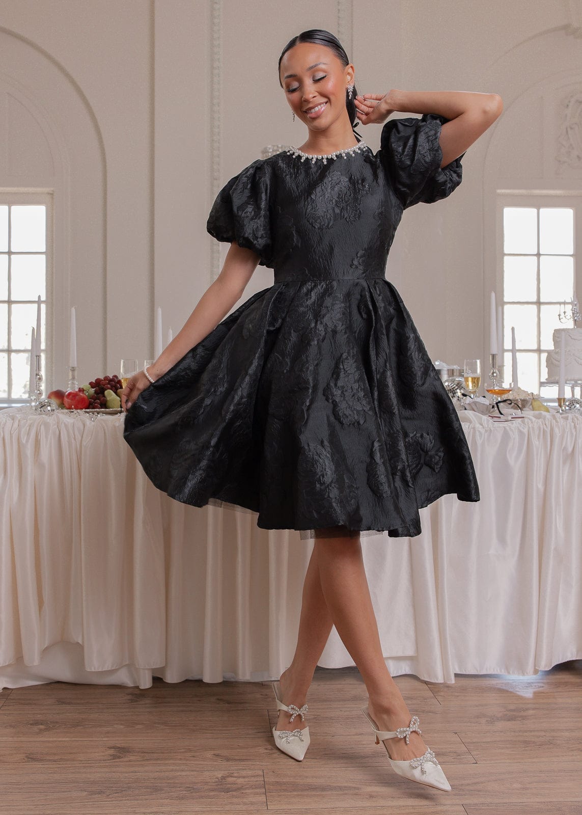 chic size inclusive model wearing JessaKae Angelina Dress