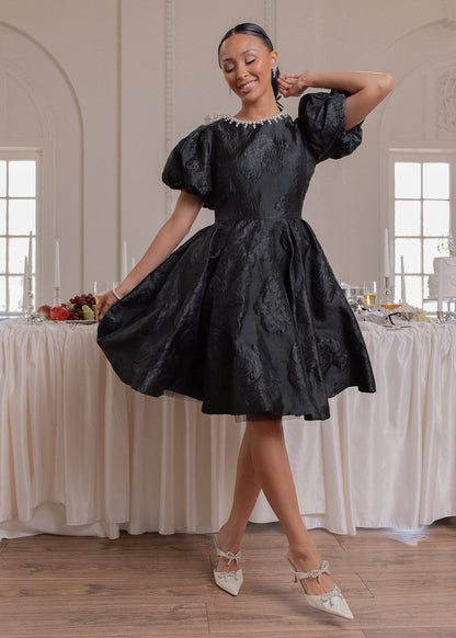 chic size inclusive model wearing JessaKae Angelina Dress