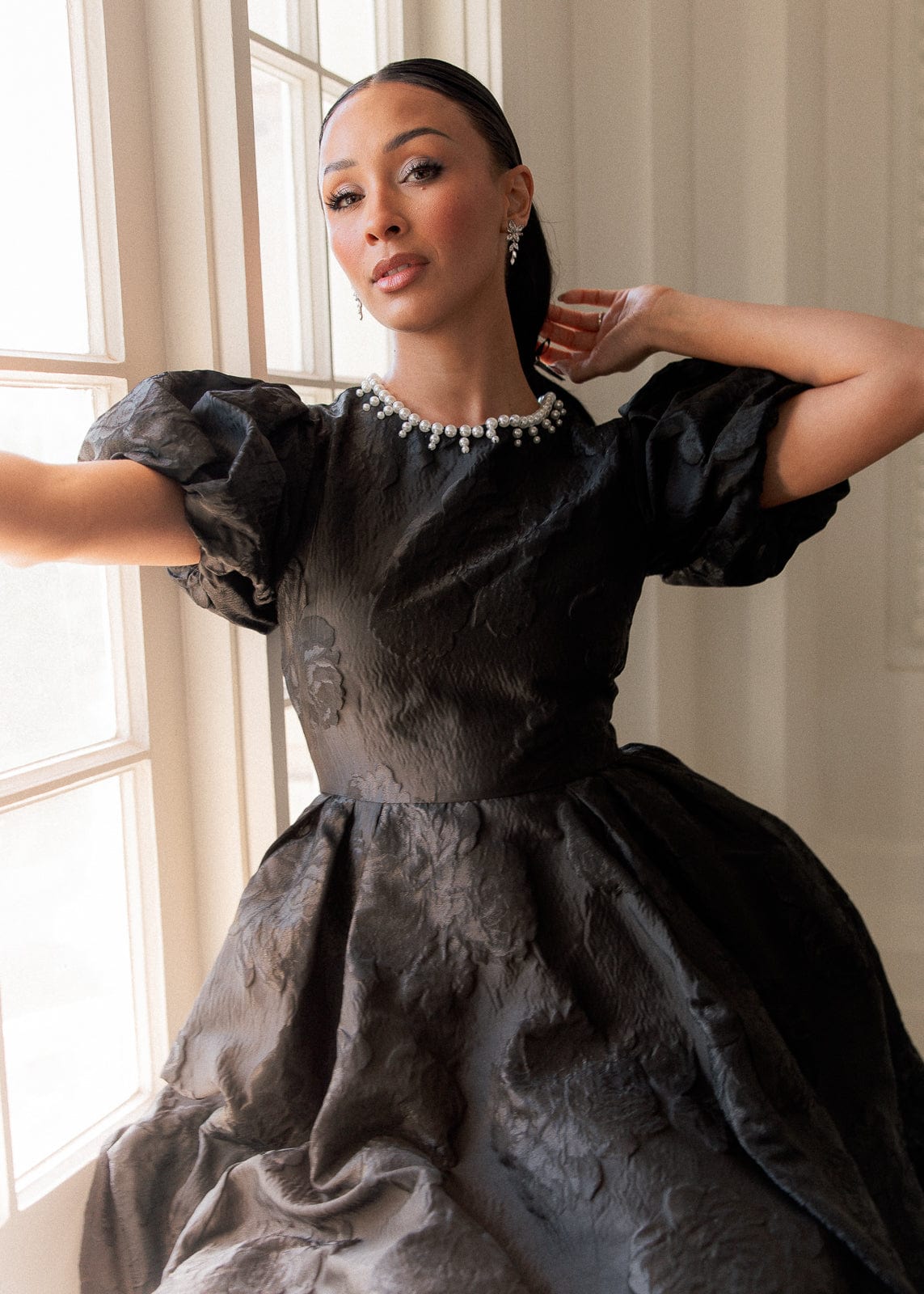 chic size inclusive model wearing JessaKae Angelina Dress