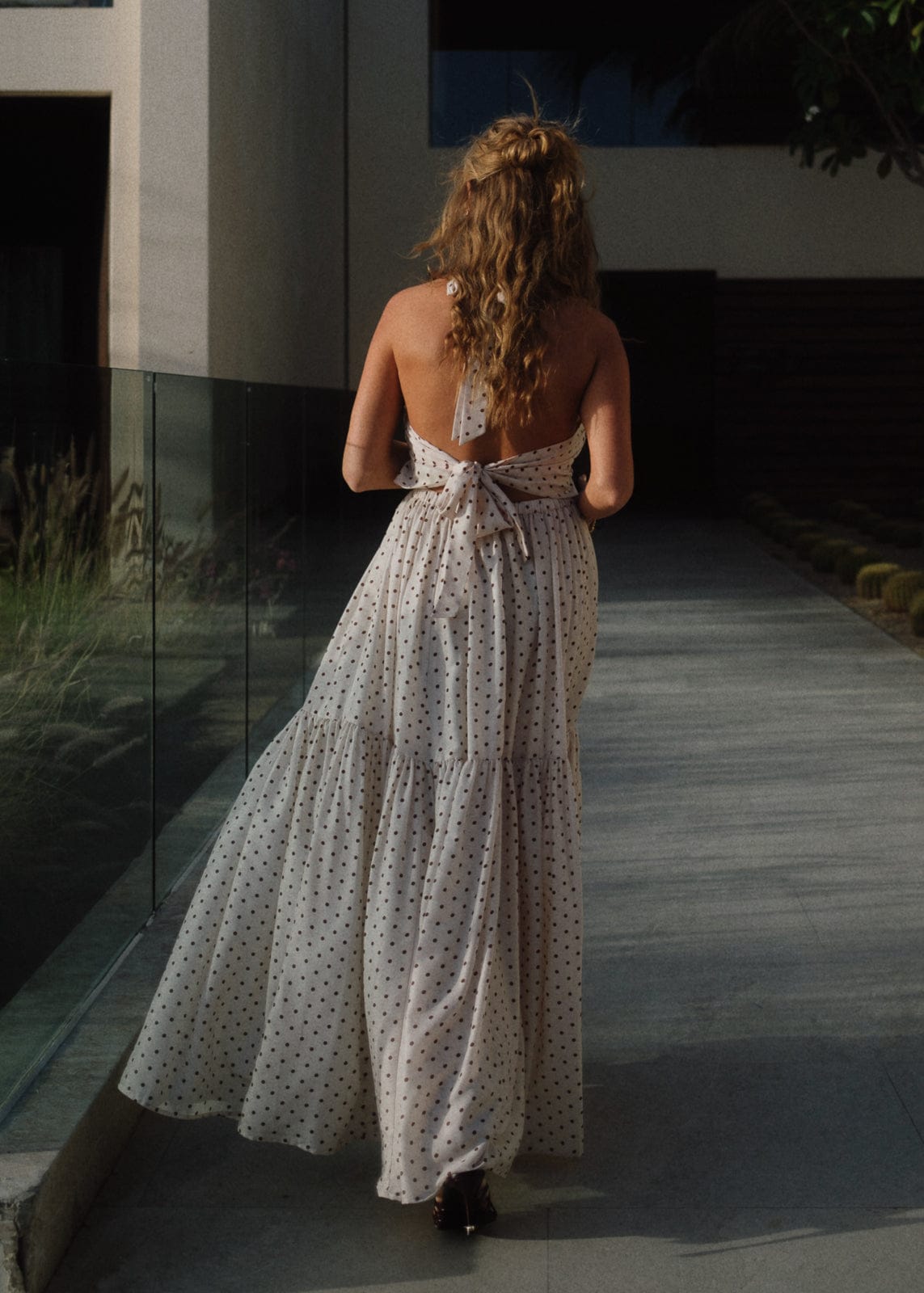 chic size inclusive model wearing JessaKae Bali Dress