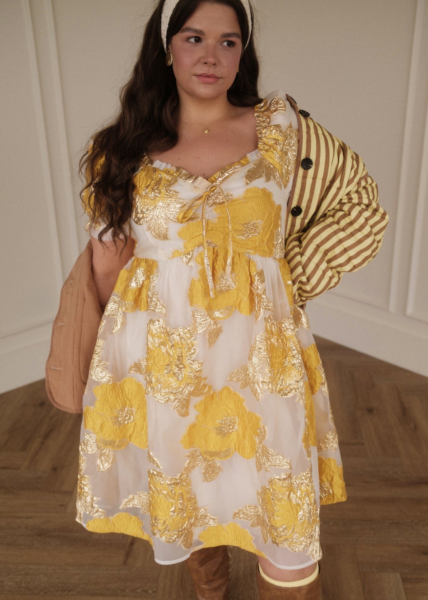 chic size inclusive model wearing JessaKae Beaumont Cream Gold Dress Dresses