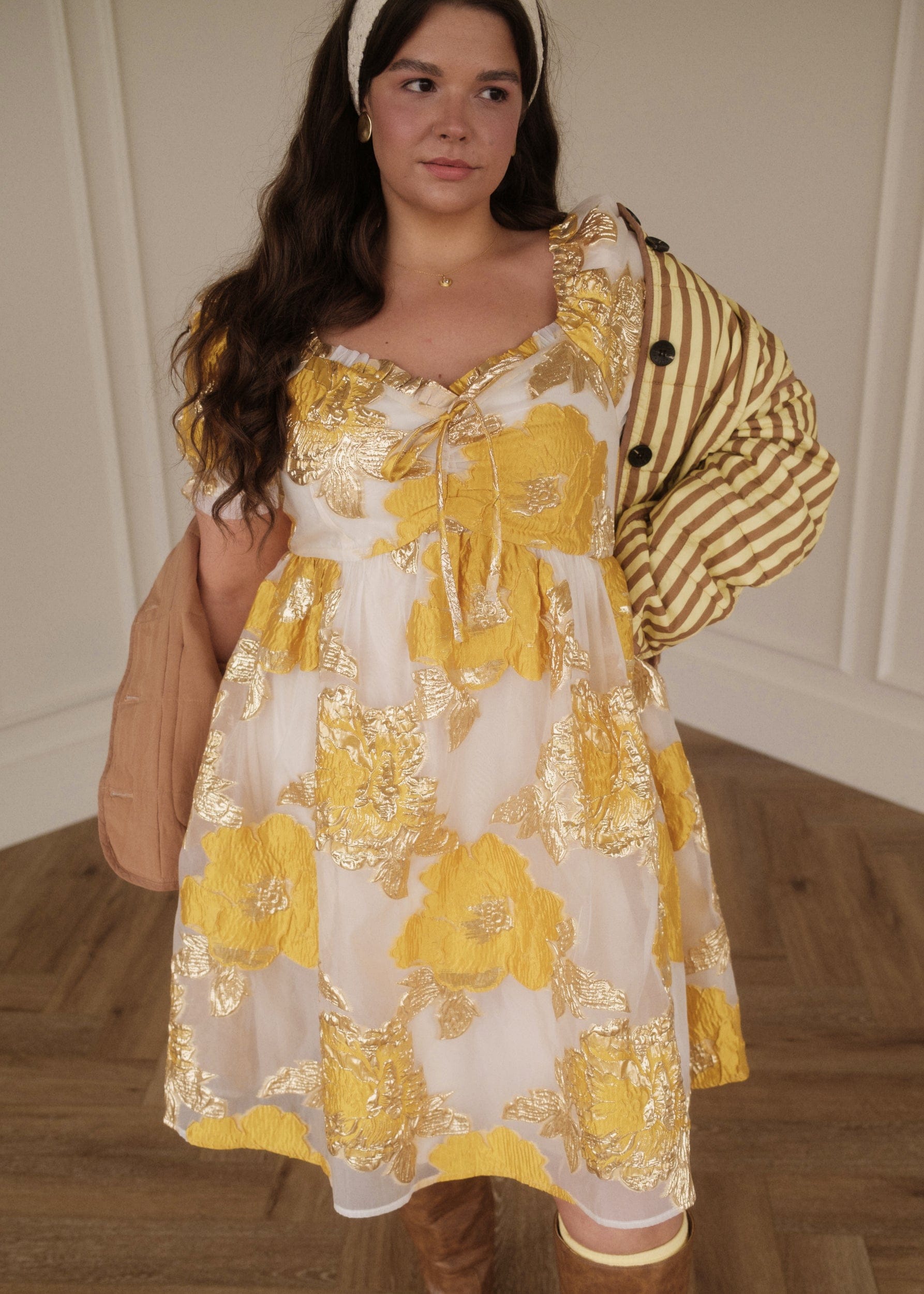 chic size inclusive model wearing JessaKae Beaumont Cream Gold Dress Dresses