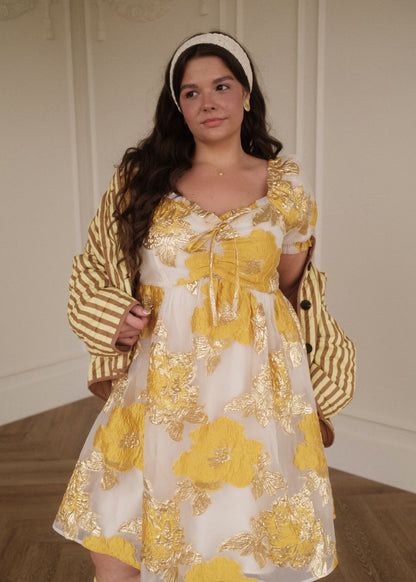 chic size inclusive model wearing JessaKae Beaumont Cream Gold Dress Dresses