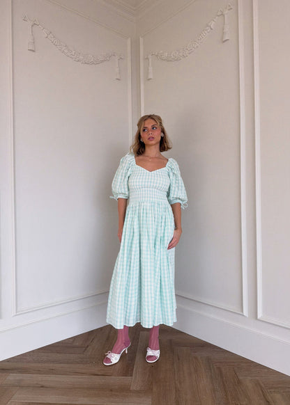 chic size inclusive model wearing JessaKae Bonnet Dress Dresses