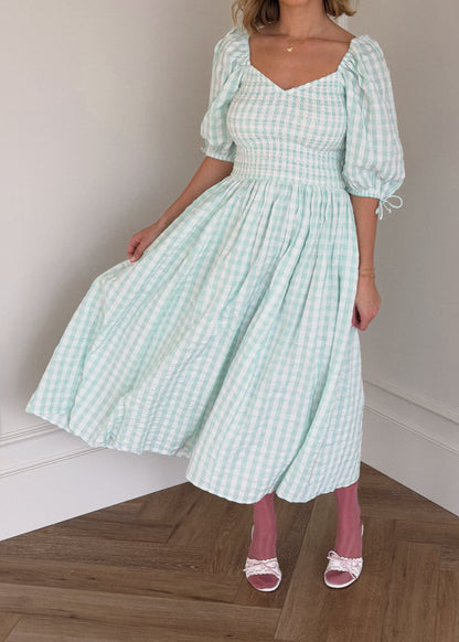 chic size inclusive model wearing JessaKae Bonnet Dress Dresses