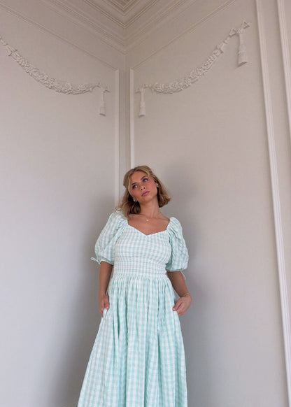 chic size inclusive model wearing JessaKae Bonnet Dress Dresses