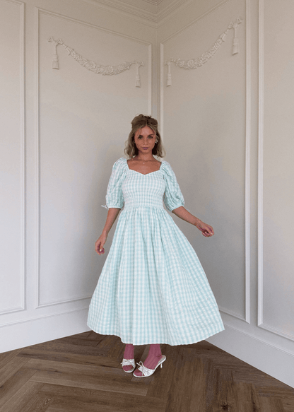 chic size inclusive model wearing JessaKae Bonnet Dress Dresses