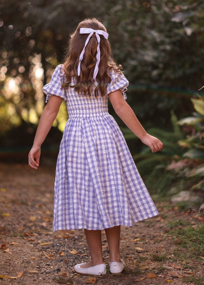 chic size inclusive model wearing JessaKae Bonnet Girls Dress