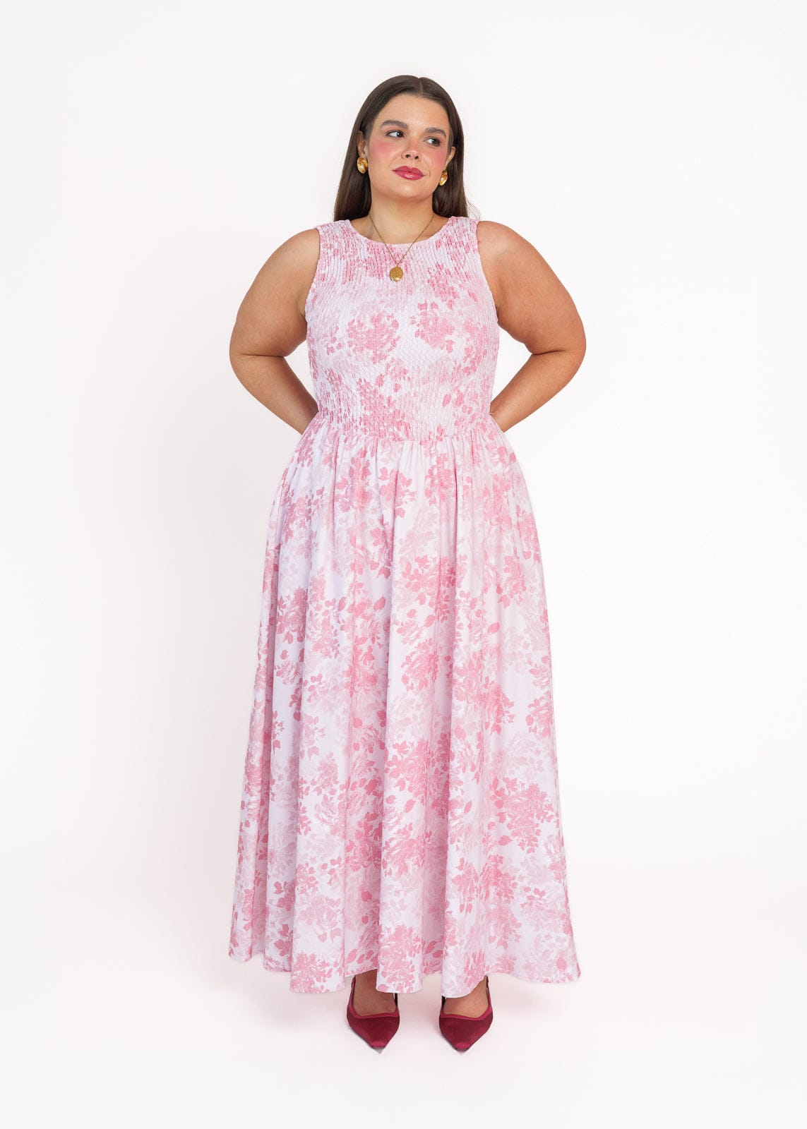 chic size inclusive model wearing JessaKae Camille Smocked Floral Maxi Dress - Pink
