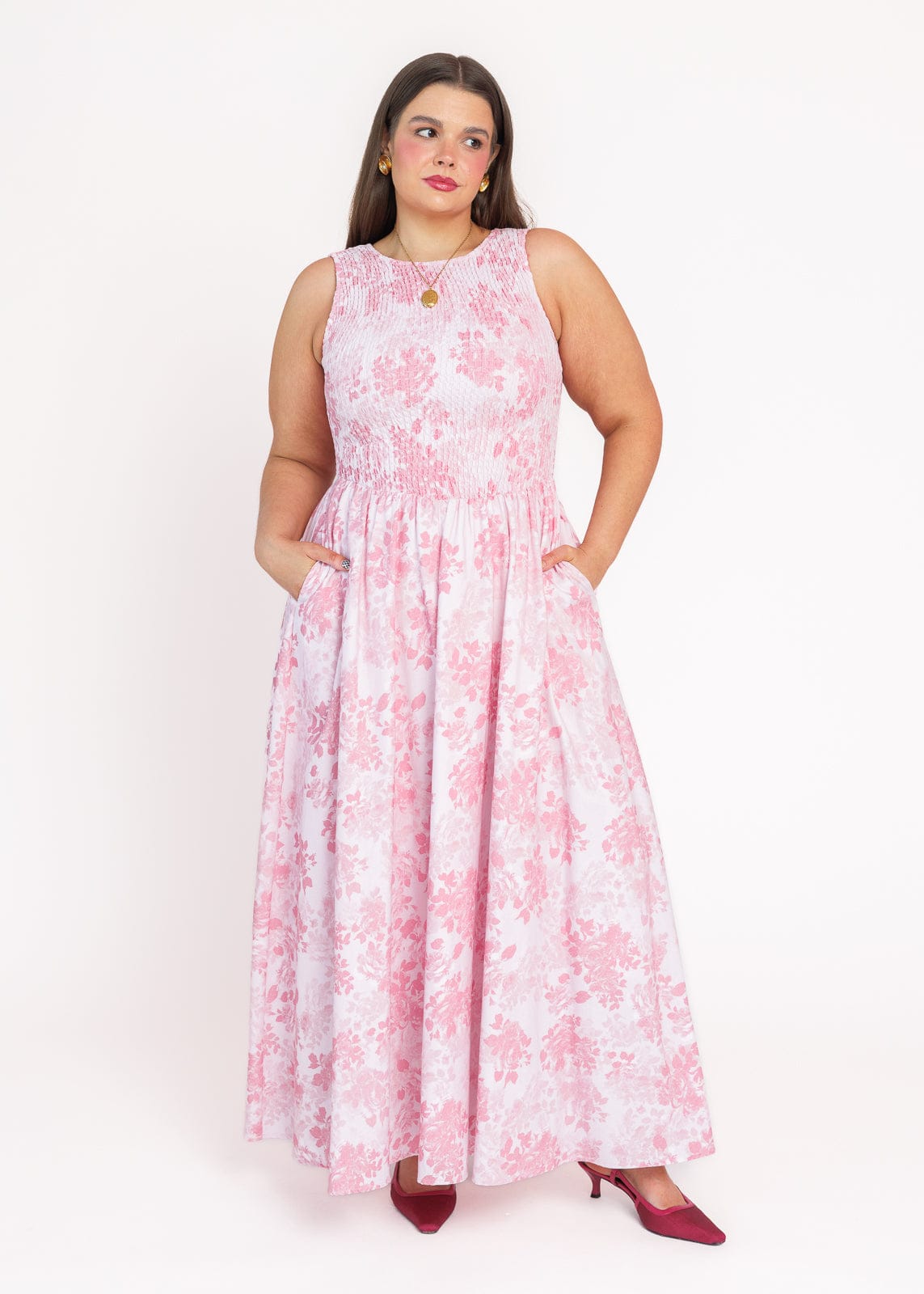 chic size inclusive model wearing JessaKae Camille Smocked Floral Maxi Dress - Pink