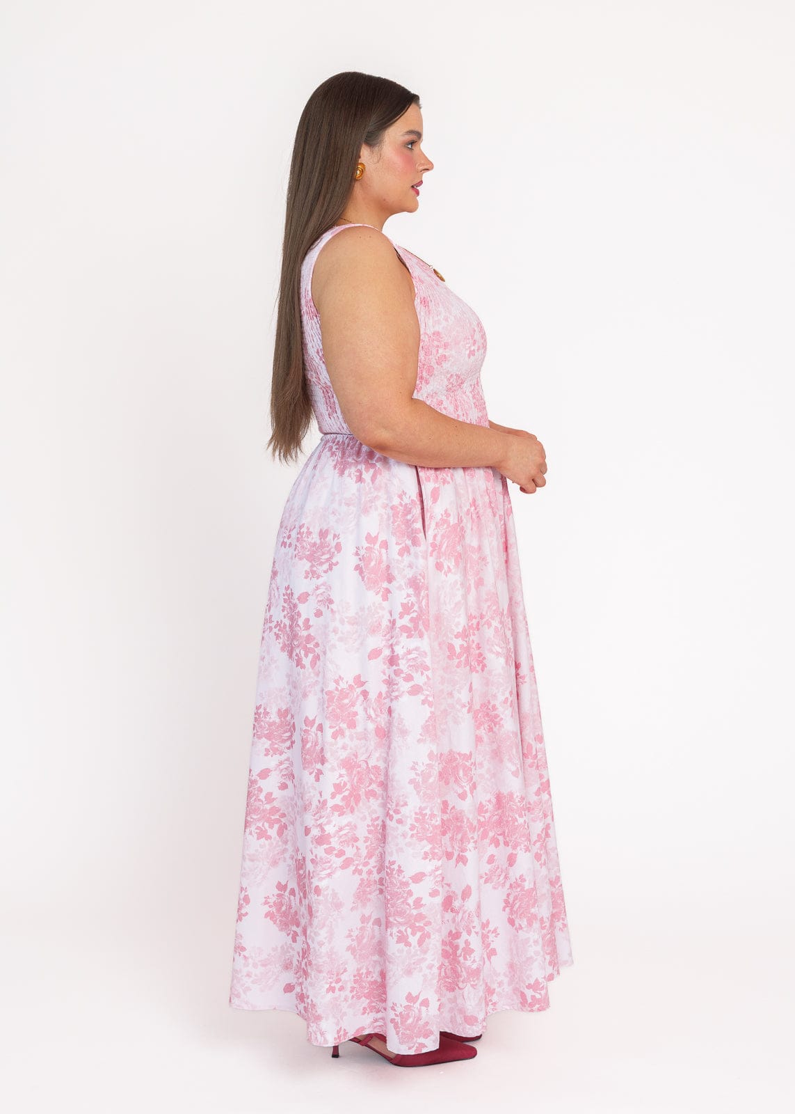 chic size inclusive model wearing JessaKae Camille Smocked Floral Maxi Dress - Pink