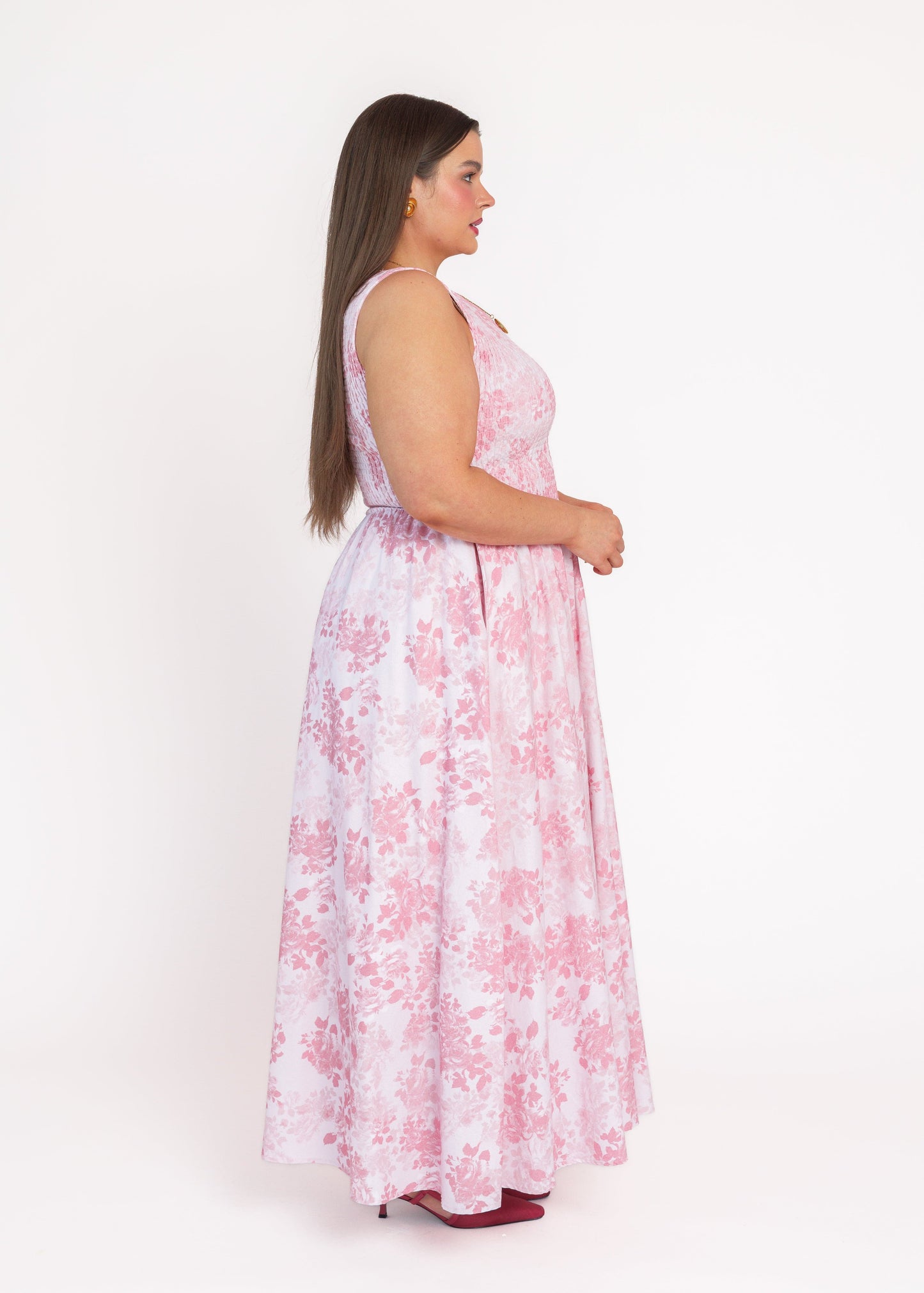 chic size inclusive model wearing JessaKae Camille Smocked Floral Maxi Dress - Pink
