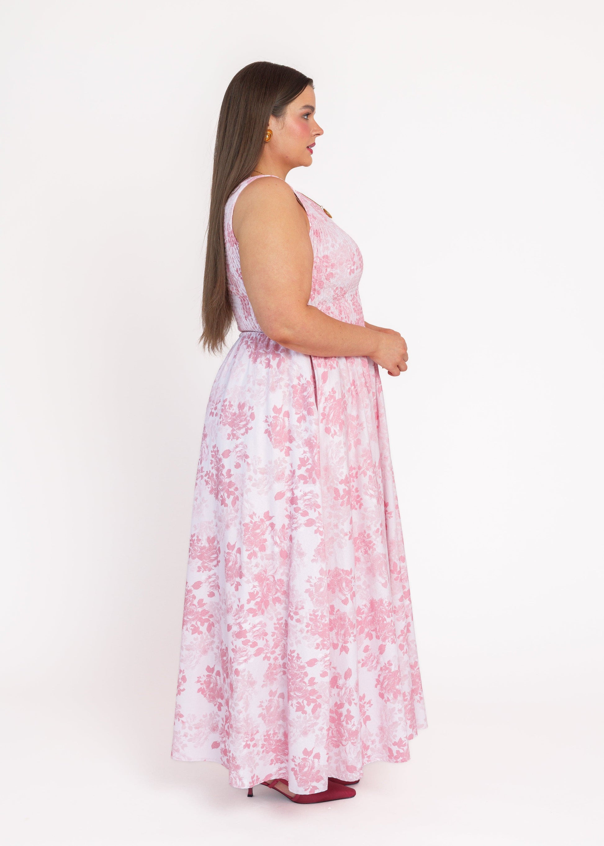 chic size inclusive model wearing JessaKae Camille Smocked Floral Maxi Dress - Pink