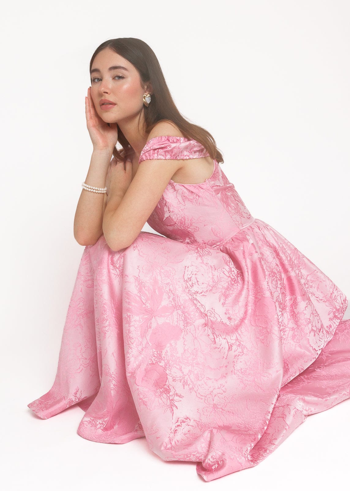 chic size inclusive model wearing JessaKae Carolyn A-Line Basque Waist Midi Dress - Pink