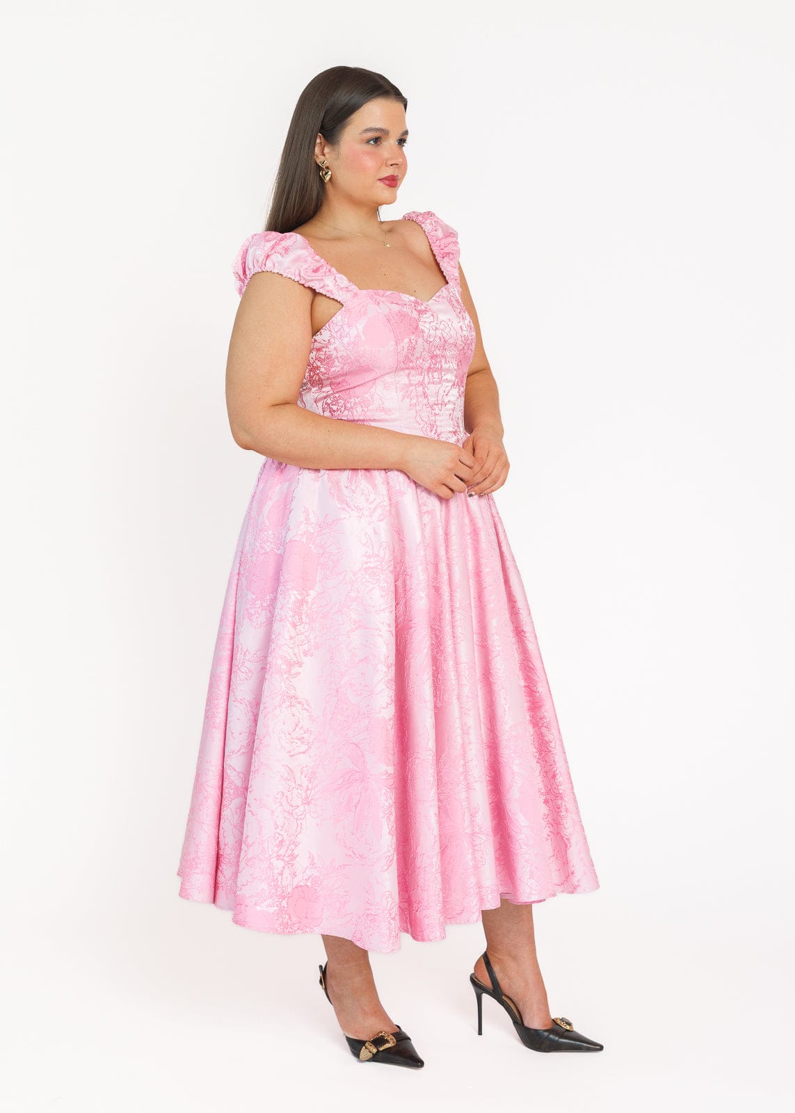 chic size inclusive model wearing JessaKae Carolyn A-Line Basque Waist Midi Dress - Pink