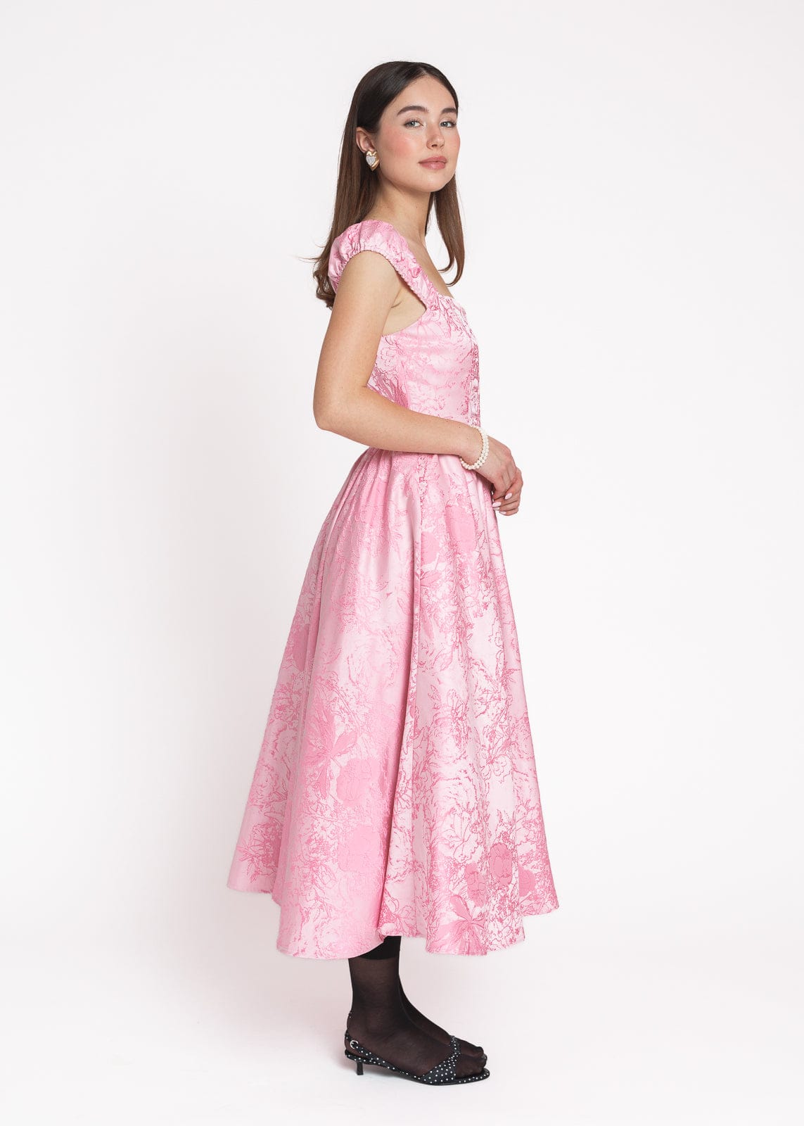 chic size inclusive model wearing JessaKae Carolyn A-Line Basque Waist Midi Dress - Pink