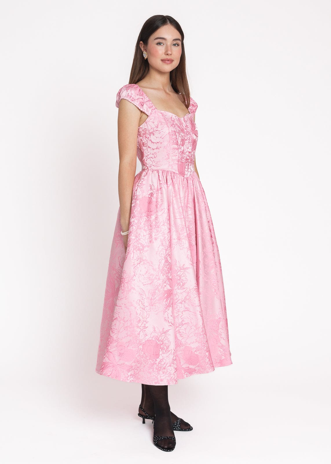 chic size inclusive model wearing JessaKae Carolyn A-Line Basque Waist Midi Dress - Pink