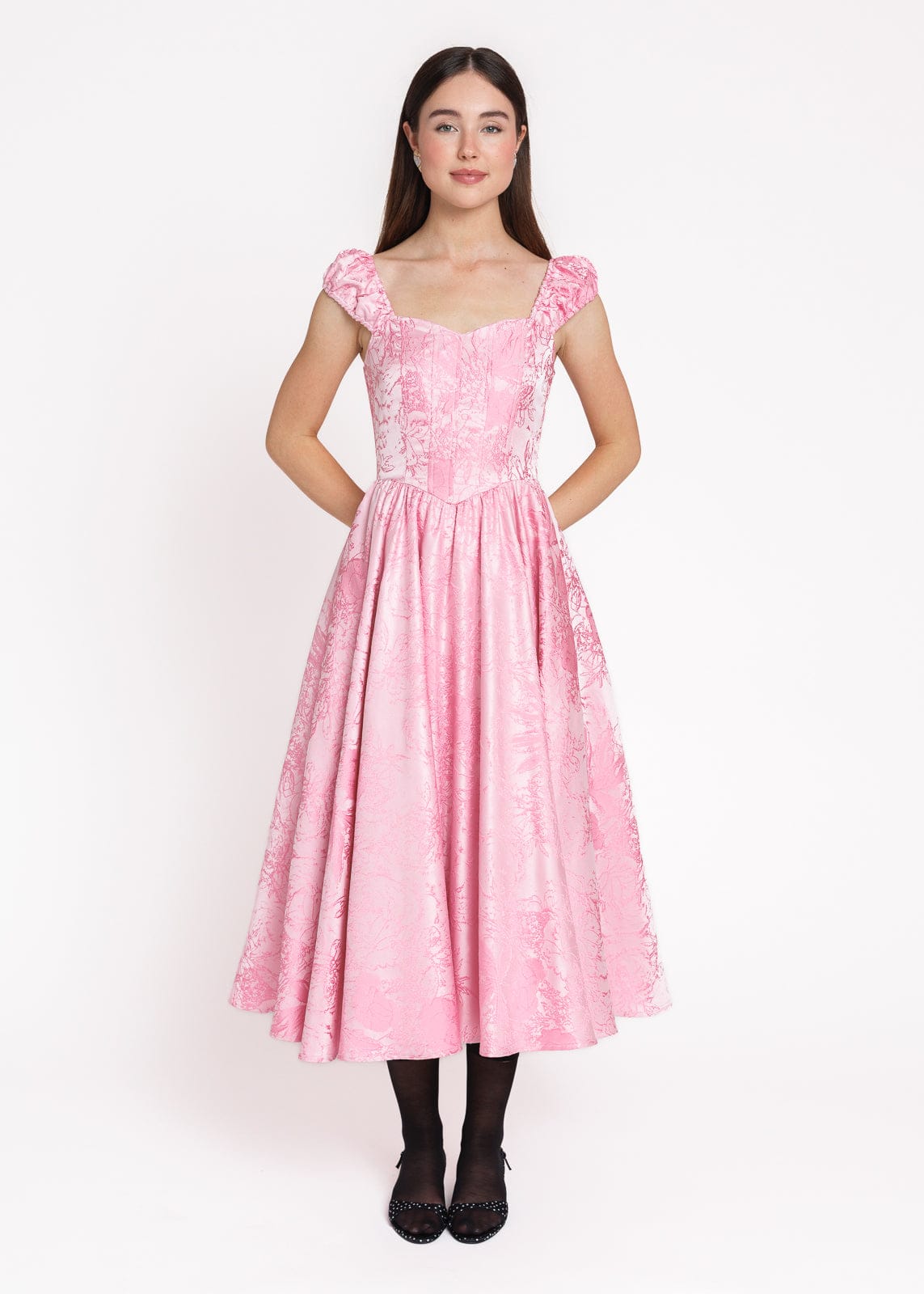 chic size inclusive model wearing JessaKae Carolyn A-Line Basque Waist Midi Dress - Pink