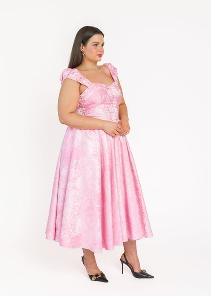 chic size inclusive model wearing JessaKae Carolyn A-Line Basque Waist Midi Dress - Pink