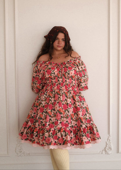 chic size inclusive model wearing JessaKae Cerise Dress