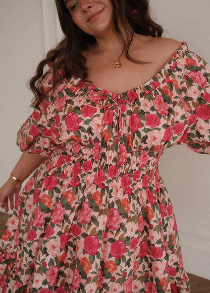 chic size inclusive model wearing JessaKae Cerise Dress