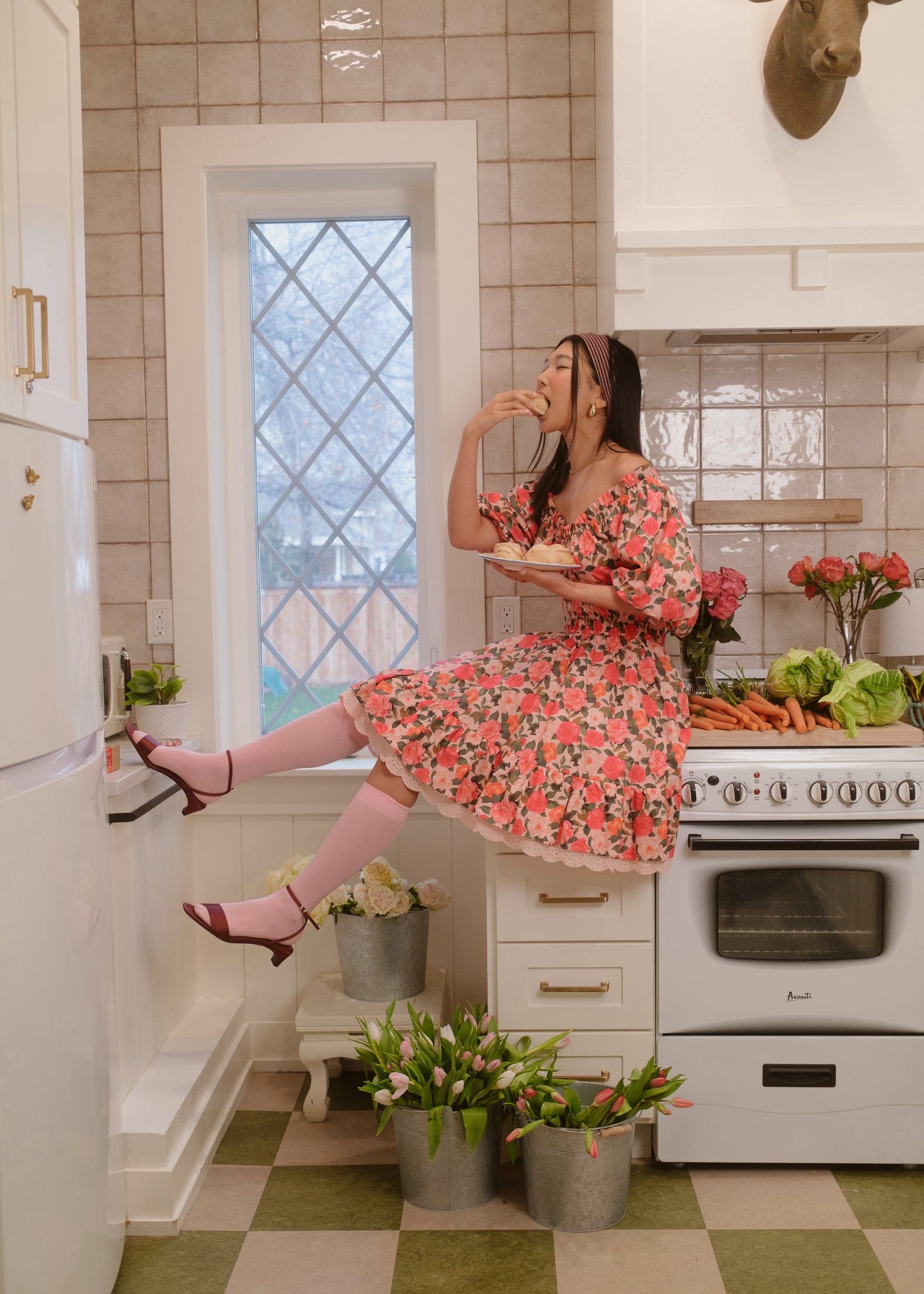 chic size inclusive model wearing JessaKae Cerise Dress