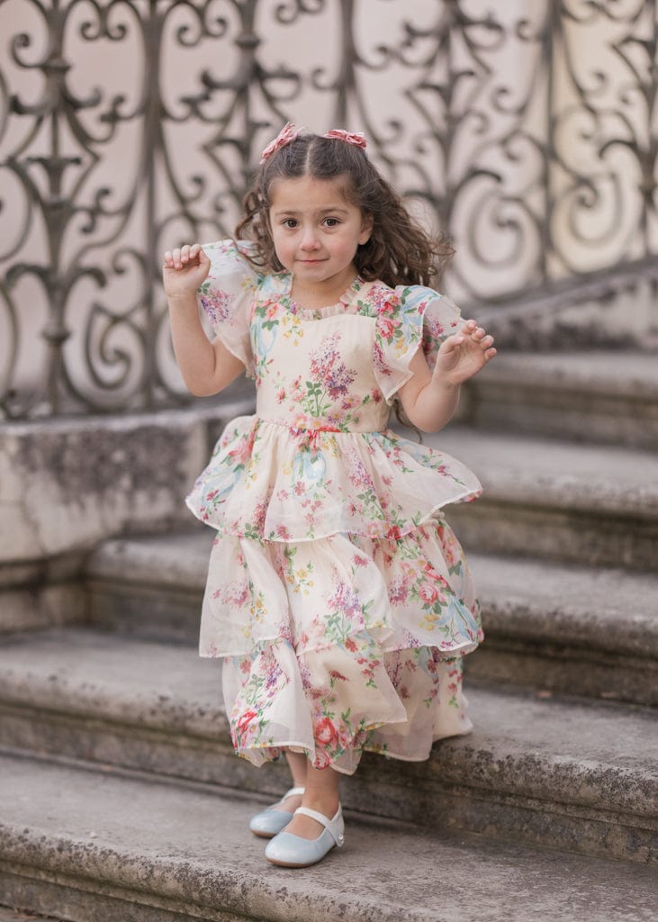 chic size inclusive model wearing JessaKae Clarabelle Girls Dress