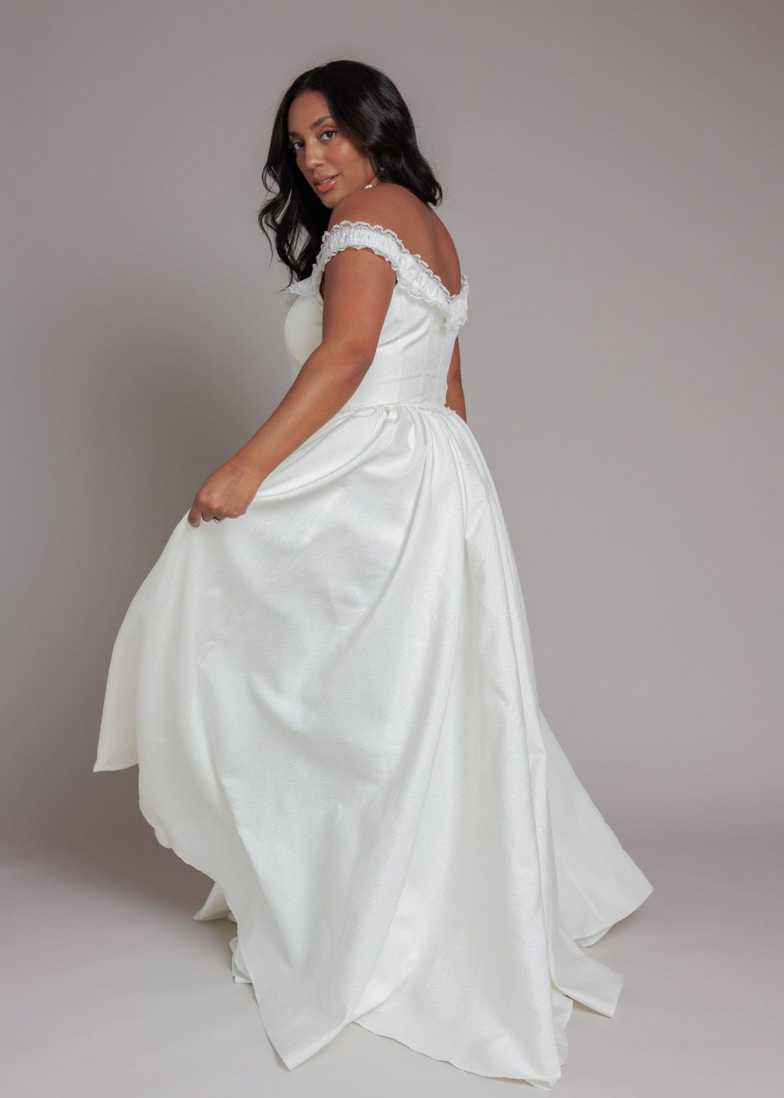 chic size inclusive model wearing JessaKae Coco Dress Dresses