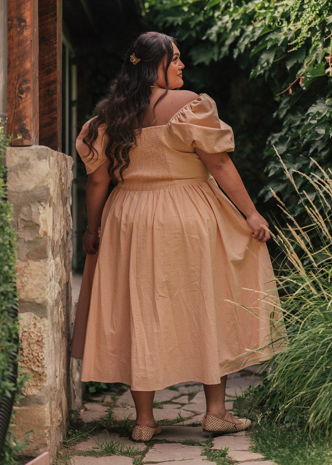 chic size inclusive model wearing JessaKae Cosette Dress