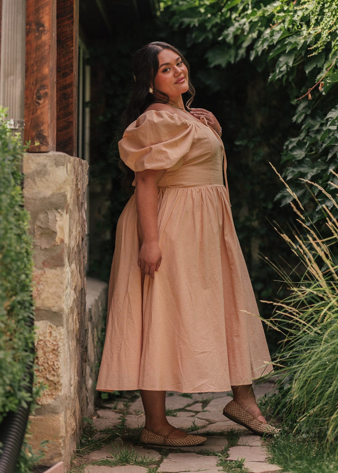 chic size inclusive model wearing JessaKae Cosette Dress