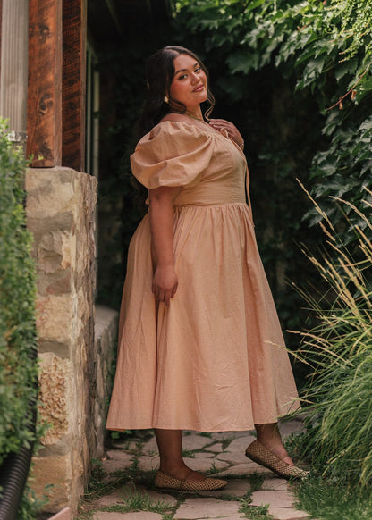 chic size inclusive model wearing JessaKae Cosette Dress